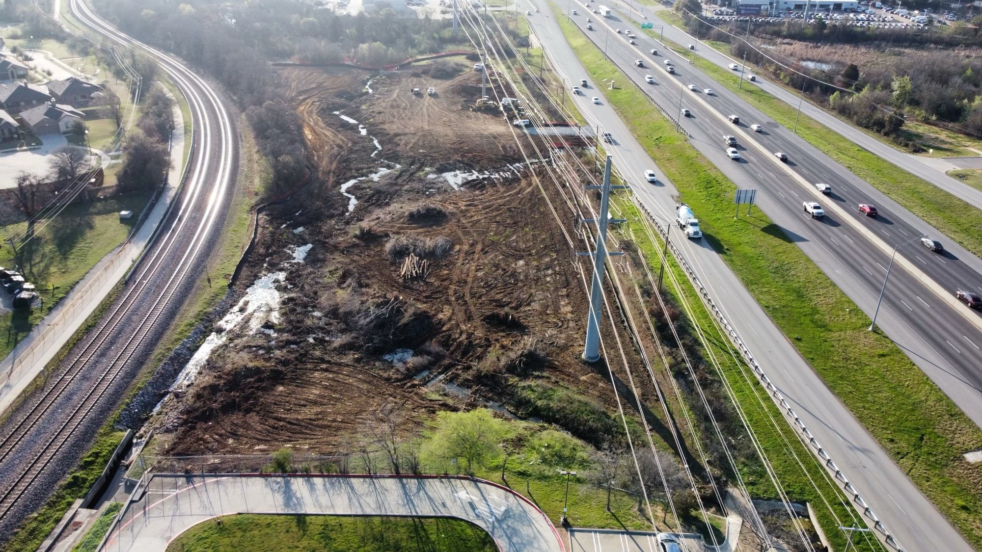 Aerial view of Bragg Light stream relocation and storm drainage work